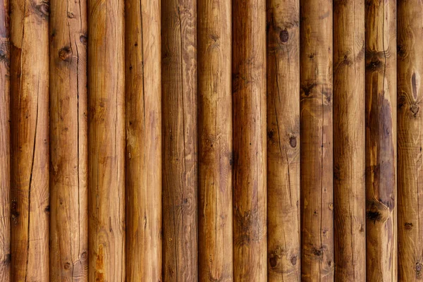 Wooden wall from logs as a background. — Stock Photo, Image