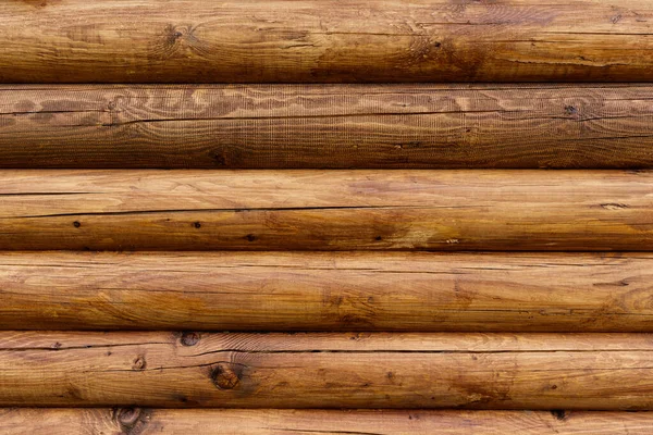 Wooden wall from logs as a background. — Stock Photo, Image