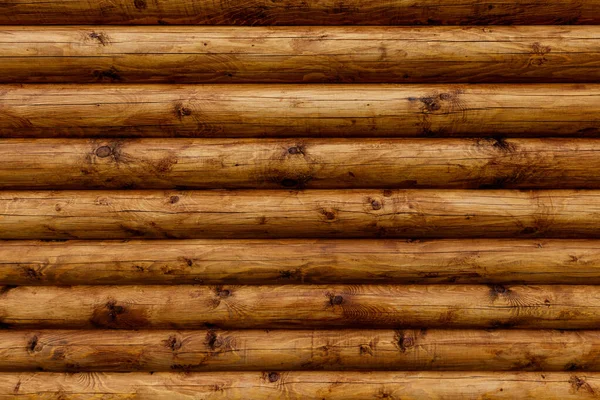 Wooden wall from logs as a background. — Stock Photo, Image