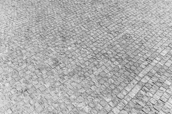 Старый тротуар из гранитной текстуры . — стоковое фото
