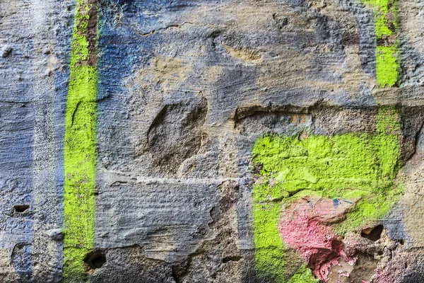 Graffiti pintado em uma textura de parede de tijolo . — Fotografia de Stock