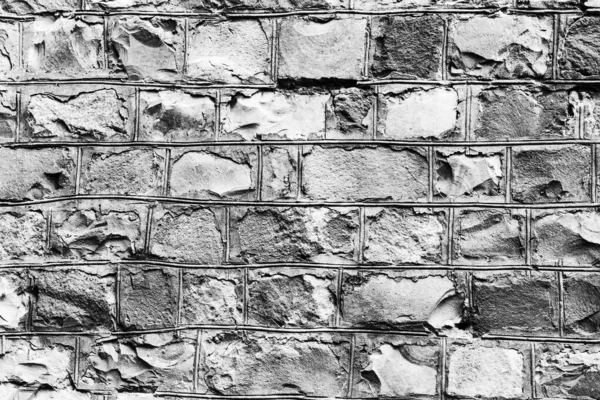 Fondo de la antigua muralla de piedra. Textura de ladrillo viejo . — Foto de Stock