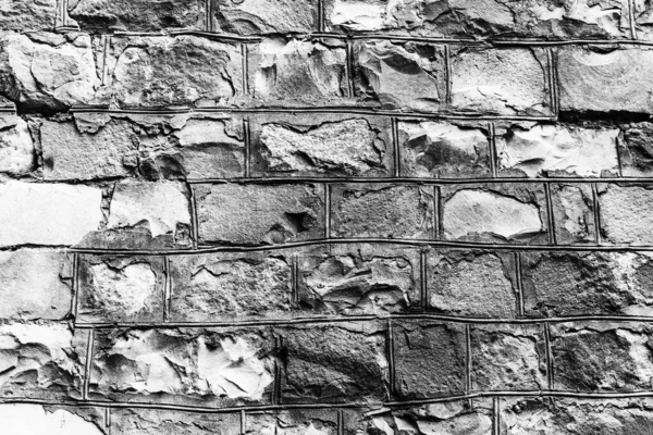 Antik taş duvarın arka planı. Eski tuğla dokusu. — Stok fotoğraf