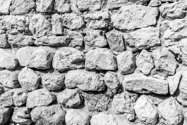 Fondo de la antigua muralla de piedra. Textura de ladrillo viejo . — Foto de Stock