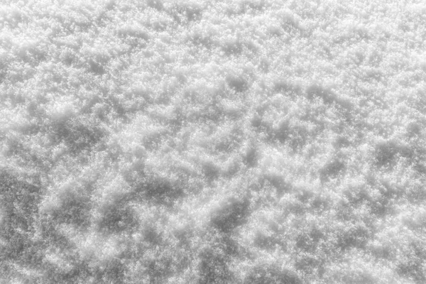 Texture de neige à la journée ensoleillée d'hiver. Contexte abstrait . — Photo