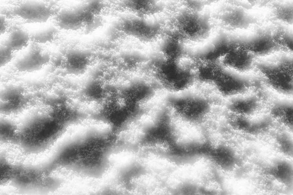 Texture de neige à la journée ensoleillée d'hiver. Contexte abstrait . — Photo