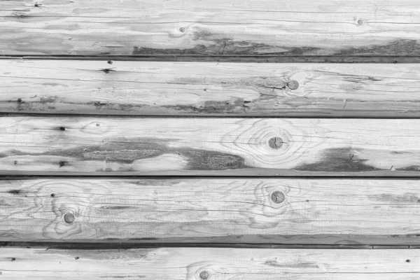 Parede de madeira de logs como fundo — Fotografia de Stock