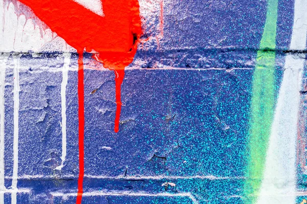 Graffiti målad på en tegelvägg konsistens. — Stockfoto