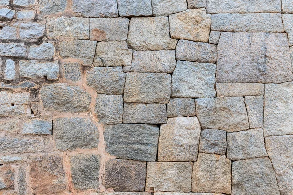 Bakgrund av gamla sten tegelvägg. — Stockfoto