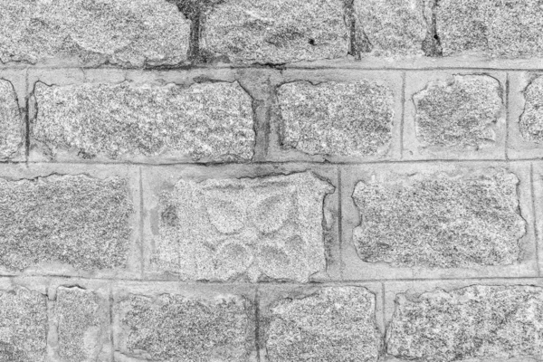 Fondo monocromo de la antigua pared de ladrillo de piedra . — Foto de Stock