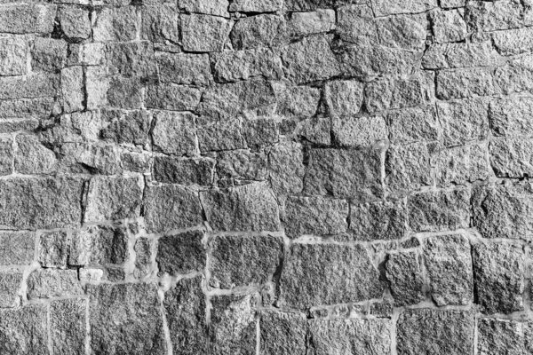 Fondo monocromo de la antigua pared de ladrillo de piedra . —  Fotos de Stock