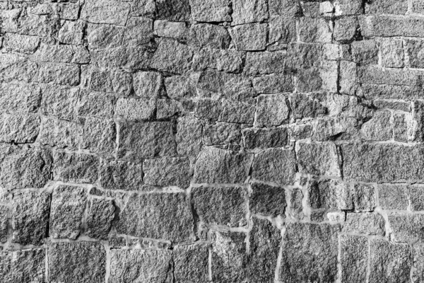 Eski taş duvarın tek renkli arkaplanı. — Stok fotoğraf