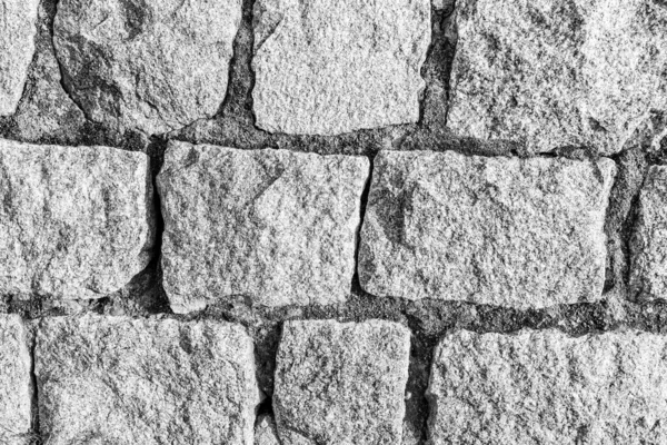 Fundo monocromático de parede de tijolo de pedra velha . — Fotografia de Stock