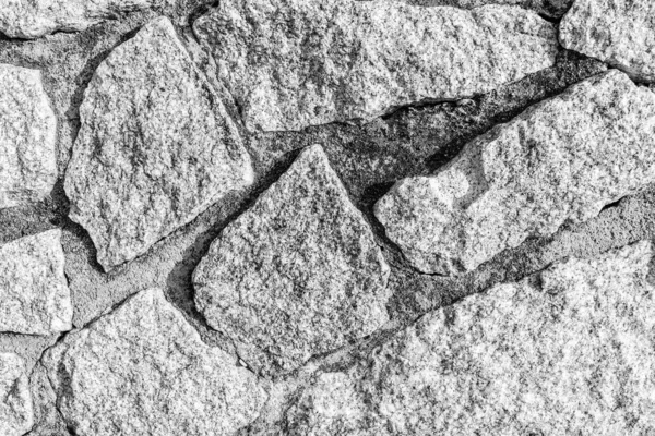오래 된 석조 벽돌 벽을 본떠 만든 모노크롬 배경. — 스톡 사진