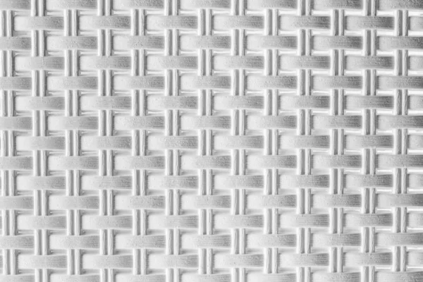 Textura z tkaného bílého plastu. — Stock fotografie
