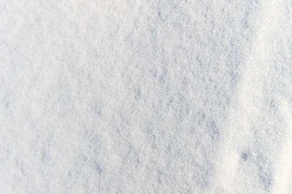 Konsystencja śniegu w słoneczny zimowy dzień. Streszczenie tła. — Zdjęcie stockowe