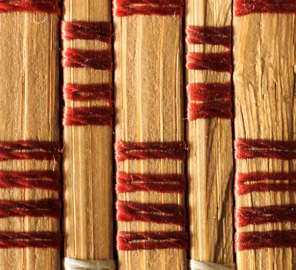 Texture of old bamboo branches with threads. — Stock Photo, Image
