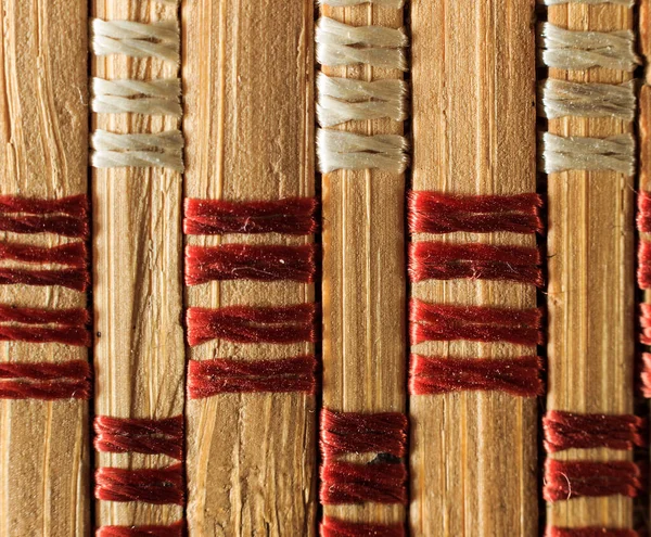 Texture of old bamboo branches with threads. — Stock Photo, Image