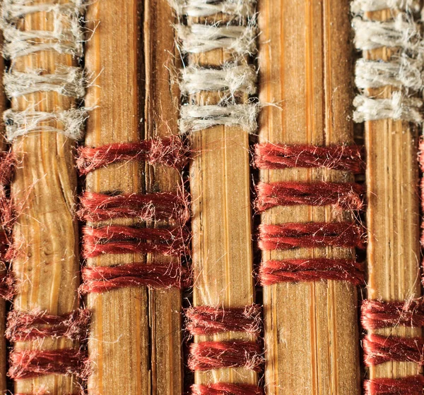 Texture of old bamboo branches with threads. — Stock Photo, Image