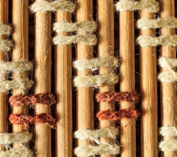 Texture of old bamboo branches with threads. — Stock Photo, Image