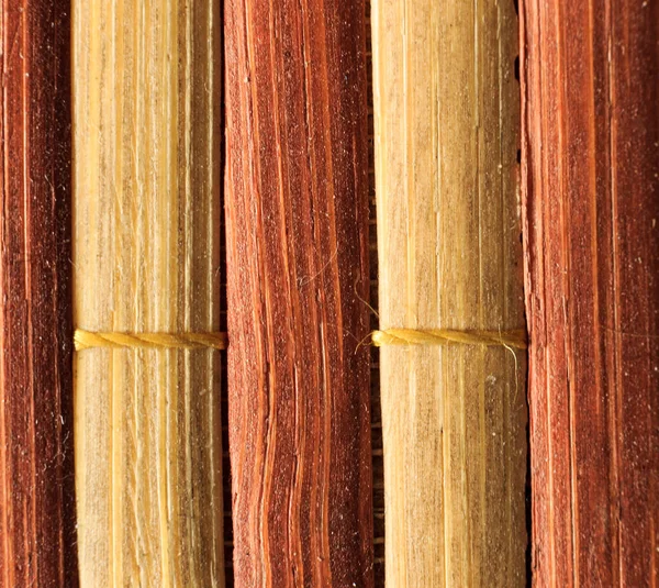 Texture of old bamboo branches with threads. — Stock Photo, Image