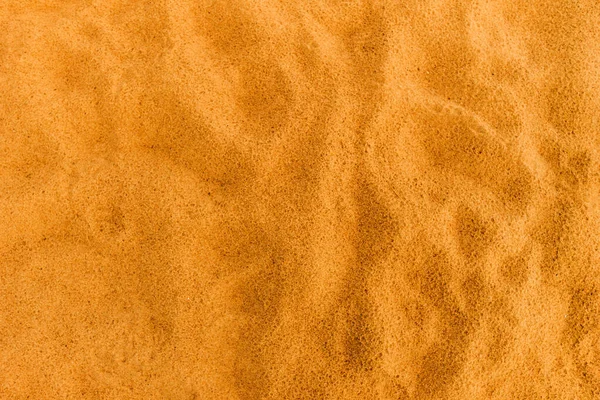 Песчаный пляж. Текстура песка — стоковое фото