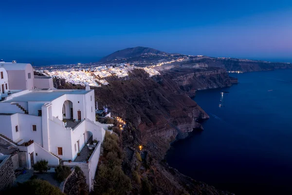 The capital of the island of Santorini Fira at night.