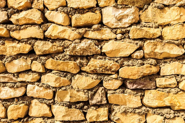 Bakgrund av antika stenmur. Textur av gammalt tegel. — Stockfoto