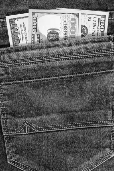 美元的牛仔裤口袋里的钞票. — 图库照片