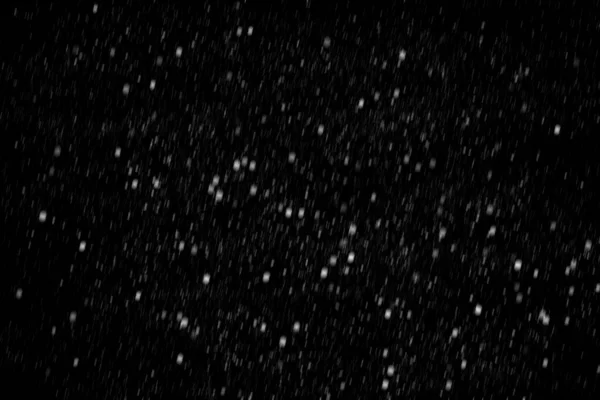 Белый снег на черном фоне текстуры . — стоковое фото