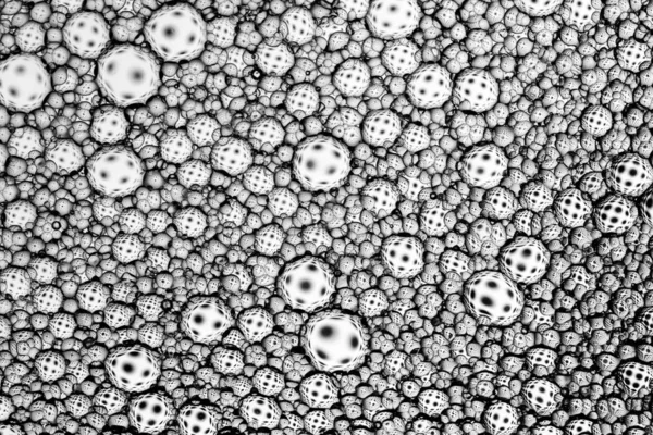 Black and white drops of oil on the water. Circles and ovals. Ab