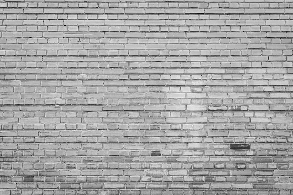 Background of old black and white stone wall. Texture of brick. — Stock Photo, Image