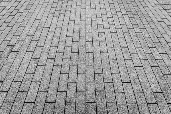 Κάτοψη πλακόστρωτου πέτρινου δρόμου. Παλιό οδόστρωμα από γρανίτη. — Φωτογραφία Αρχείου