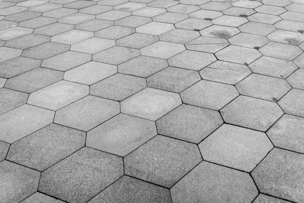 Vue de dessus sur la route pavée. Ancien pavement de texture de granit . — Photo