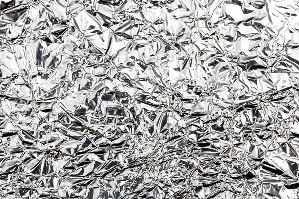 Textur aus zerknitterter Aluminium-Küchenfolie. — Stockfoto