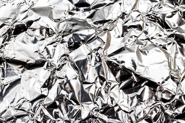 Konsistens av skrynklig aluminium köksfolie. — Stockfoto