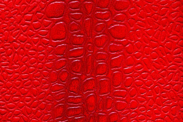 Rote Textur aus synthetischem Leder. abstrakter Hintergrund für Design. — Stockfoto