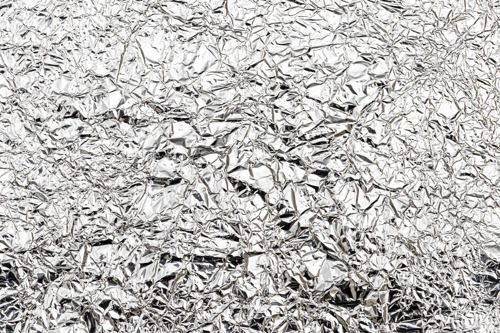 Texture of crumpled aluminum kitchen foil.