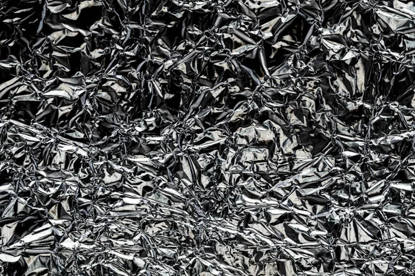 Textura da folha de cozinha de alumínio amassado. Prata abstrato backd — Fotografia de Stock