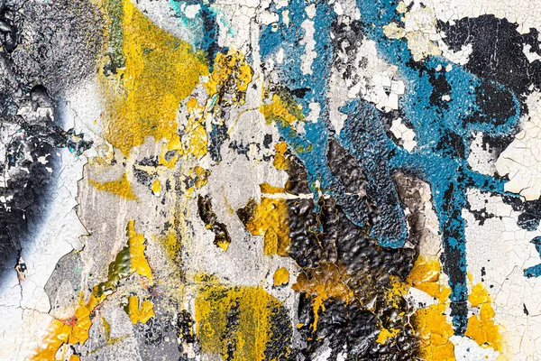 Fragment de graffiti coloré peint sur un mur. Fond abstrait lumineux pour la conception avec peeling peinture . — Photo