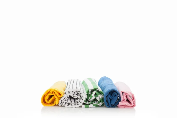 Montón de ropa colorida aislada sobre fondo blanco . — Foto de Stock