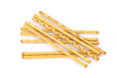 Çıtır çıtır ekmek saman beyaz zemin üzerine.