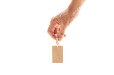 el erkek tutan küçük kahverengi etiket, fiyat etiketi, hediye etiketi, Satılık etiketi