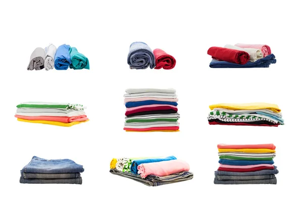 Stapels van kleurrijke kleding collectie geïsoleerd op witte backgro — Stockfoto