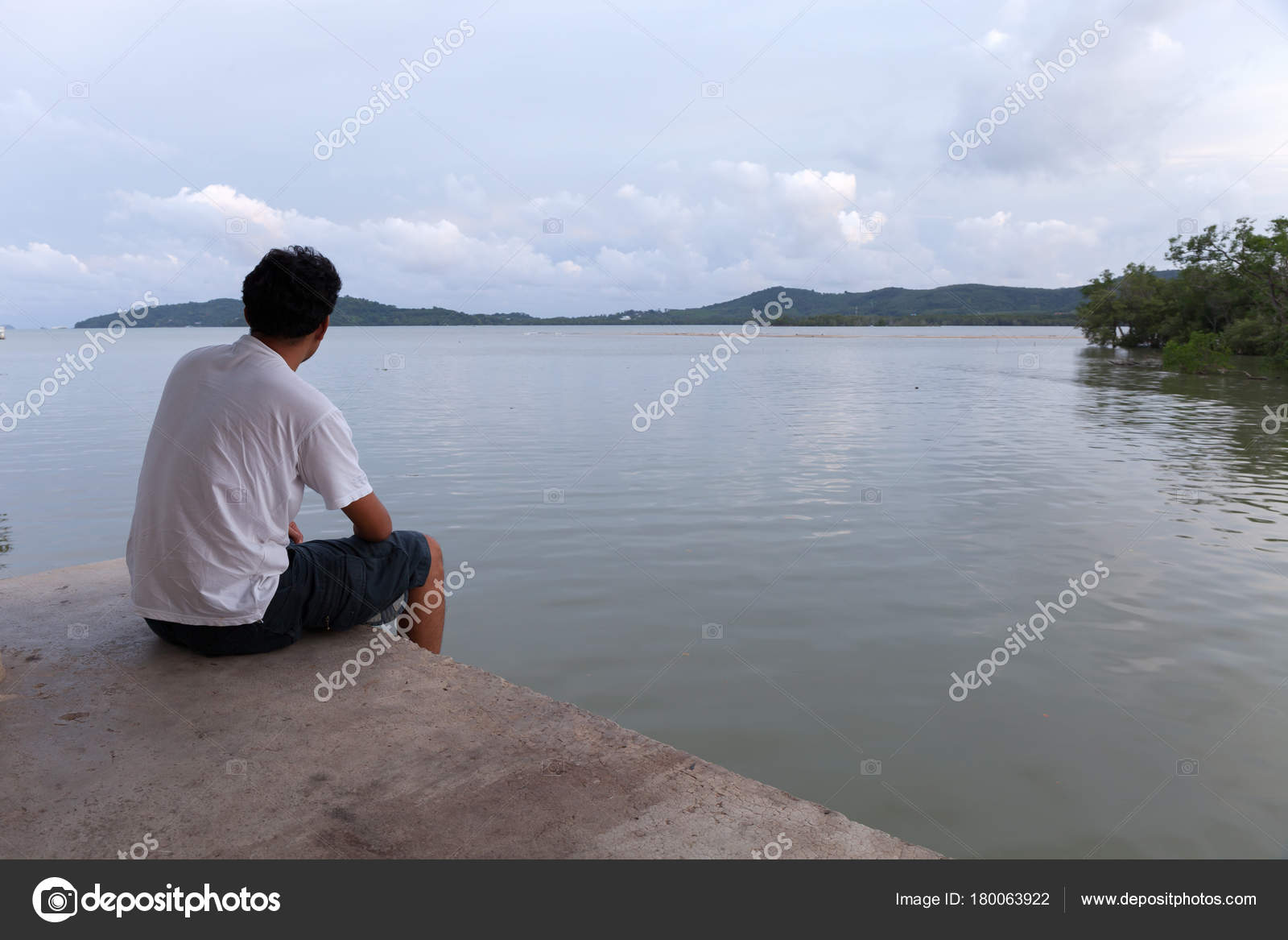 Lonely Asian Man Sitting Alone On A Pier On Sea In Phuket Stock Photo Image By C Panya9966