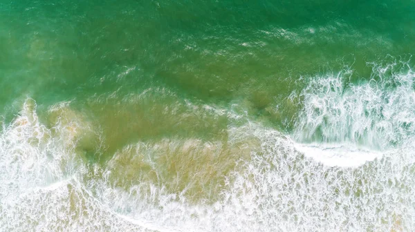 Top view nature landscape of Flowing wave white seafoam — ストック写真