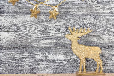 Altın Christmas dekorasyon - Ren geyiği ve yıldız ile arka plan