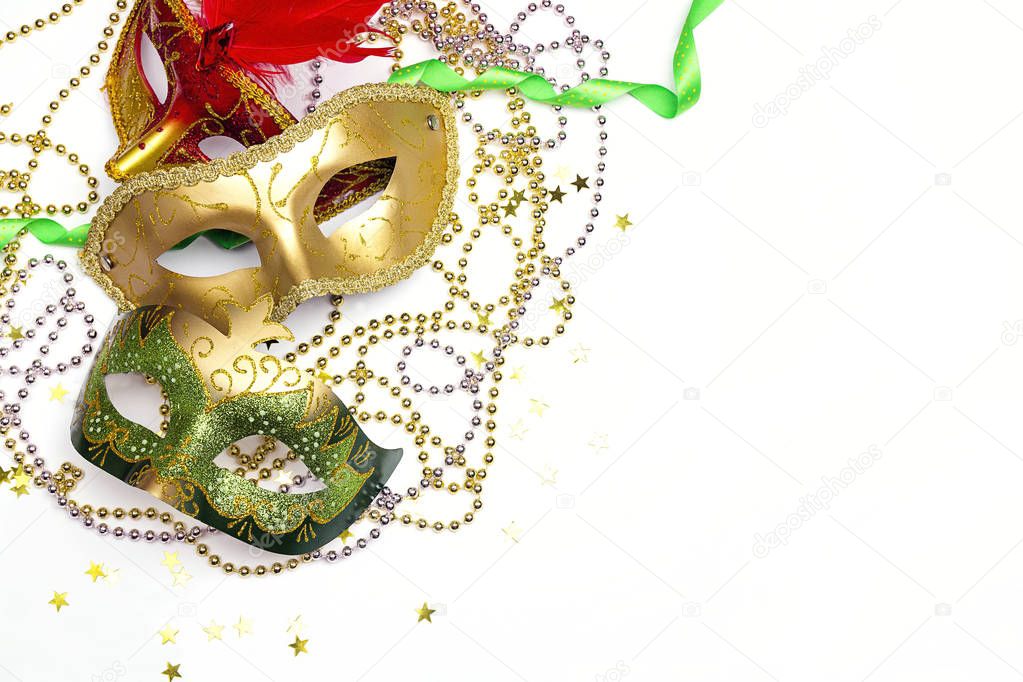 Festive  Carnivale mask with beads on a white background.  Copy 
