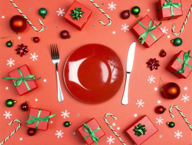 Christmas festive table setting with cutlery and decorations on 