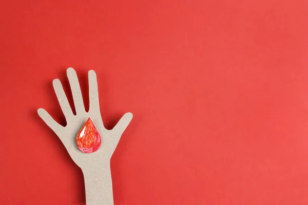 Símbolo Mão Com Uma Gota Sangue Sobre Fundo Vermelho Com — Fotografia de Stock